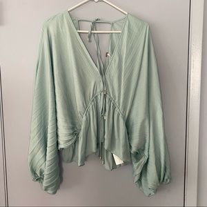Free People size Small mint silk like shirt.